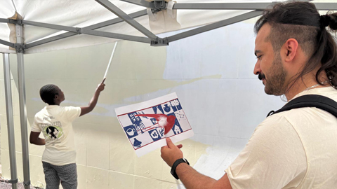 IMGPintantMurRefugiats